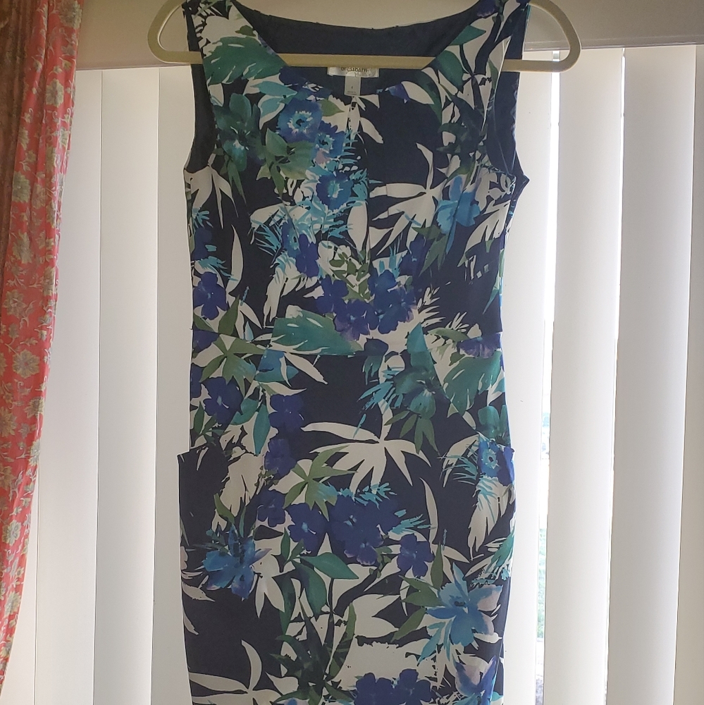Lightly worn fitted dress with navy and royal blue floral palette